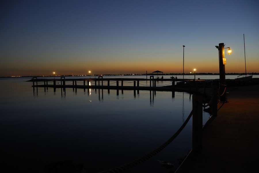The daylight giving way to the night sky at the fishing pier at Chandlers Landing on Lake Ray Hubbard, Rockwall Texas.; Shutterstock ID 46904704