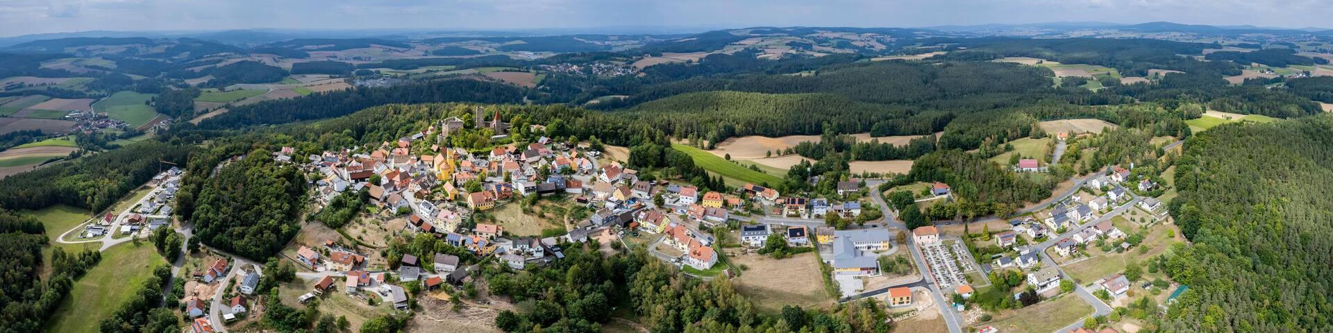 Aerial around the old town Lauterhofen in Germany on a sunny day in spring