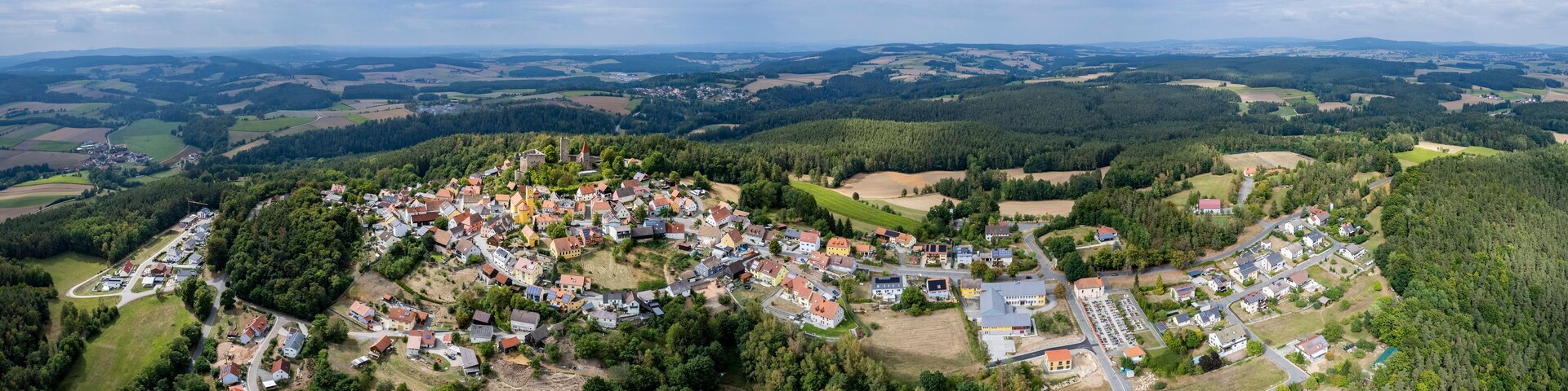 Aerial around the old town Lauterhofen in Germany on a sunny day in spring