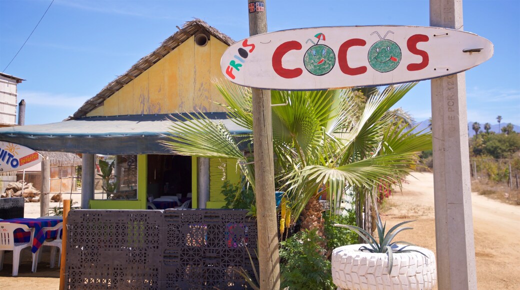 Los Cerritos Beach featuring a small town or village and signage