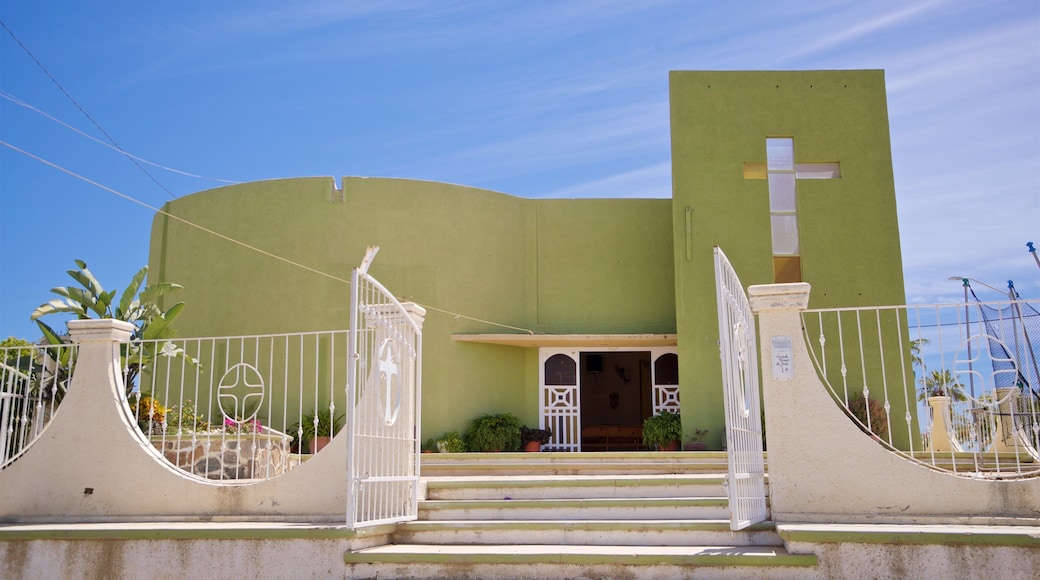Los Cerritos Beach which includes a church or cathedral