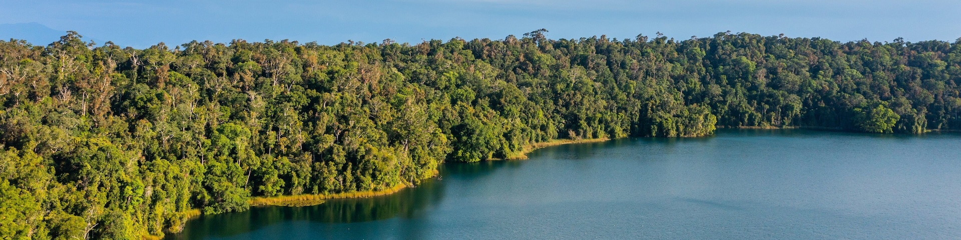 Crater Lakes National Park featuring a lake or waterhole, forest scenes and tranquil scenes