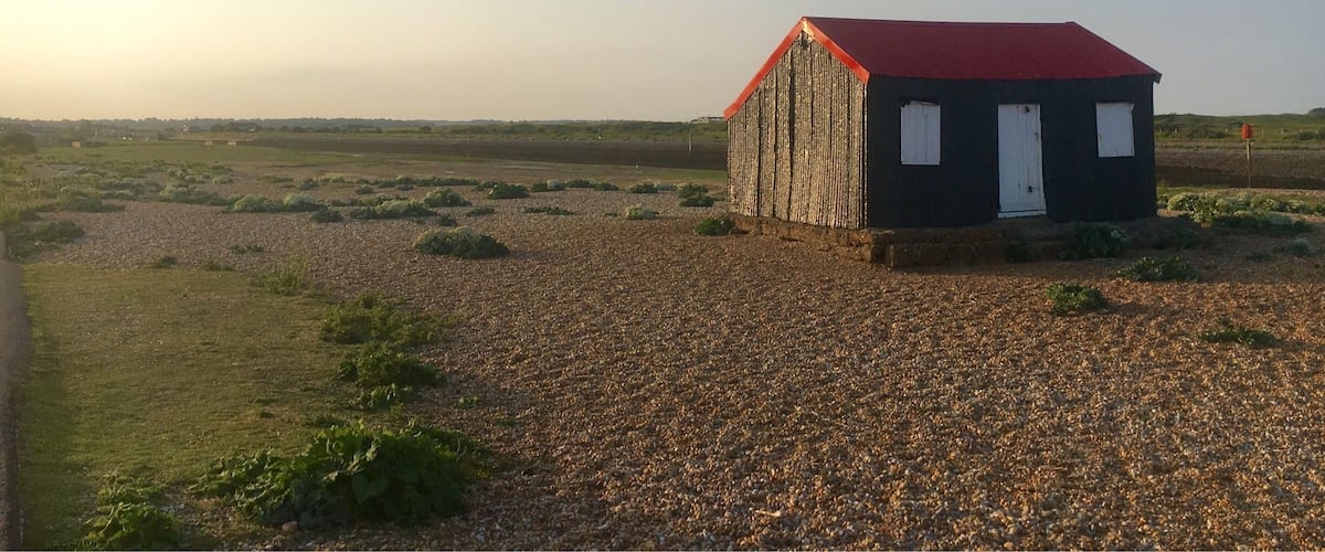 Cool beach walk on Rye coast. Little red roof.