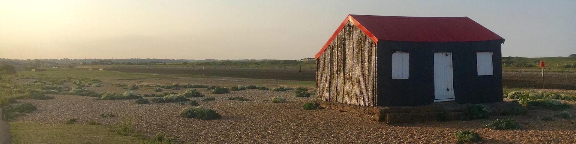 Cool beach walk on Rye coast. Little red roof.