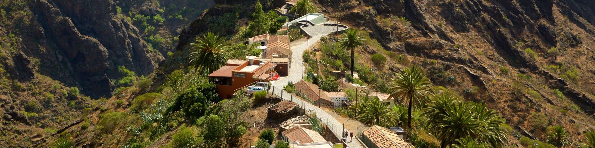 Masca showing mountains and a small town or village