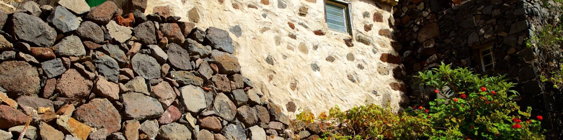 Masca which includes a house