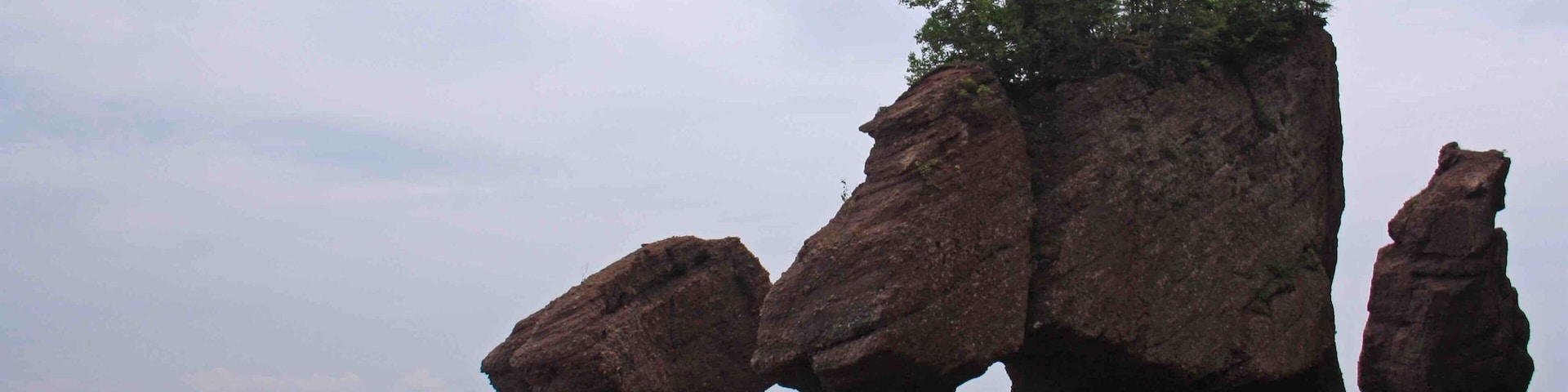 Kayaking in the Bay of Fundy around the Hopewell Rocks in New Brunswick. The highest tides in the world. We were walking around and under these rocks a few hours later.