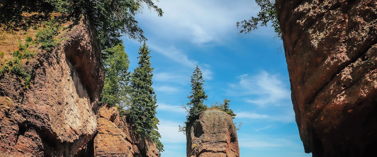 When in New Brunswick you must visit Hopewell Rocks before more pillars come tumbling down. These pillars (also known as flower pots) have been caused by tidal wave erosion and span up towards 70 feet tall. During low tide you can walk along the ocean floor to catch a close up view of their enormous size. As this is a very popular tourist spot, during the summer months you can expect it to be extremely busy. Parking is free but there is a fee to go into the park to see the rocks. If you want to walk on the ocean floor, I recommend that you check their website before you are expecting to leave to view when low tides will occur as this is the only time you can do this. The park is dog-leash pet friendly (meaning keep your dog on a leash and all will be well) - however dogs are not permitted in any of the main buildings such as the gift shop etc. There is a playground area for the kiddies, a small cafeteria style restaurant, gift shop, washrooms, and information station. If you view all the key highlights of the park you can expect to spend about 3 hours here with a total hiking / walking time of approx. 6 to 7 KM with some trails at steeper elevations (such as the beach trail).