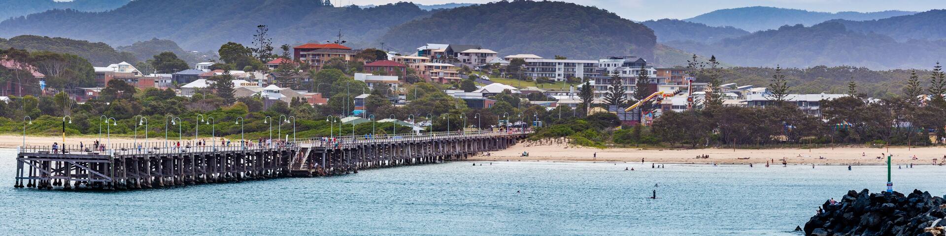 Panoramic landscape of Coffs Harbour jetty and luxury real estate. Coffs Harbour, New South Wales, Australia