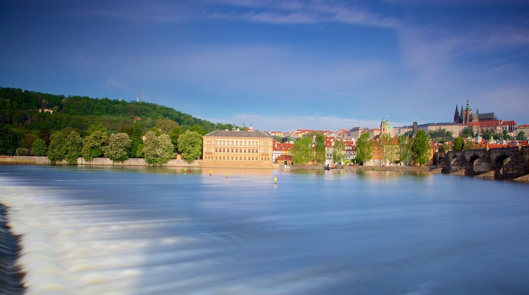 Hradcany Castle District featuring a coastal town and general coastal views