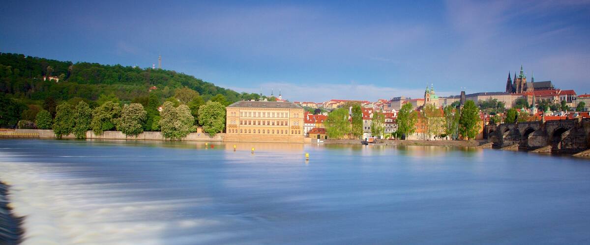 Hradcany Castle District featuring a coastal town and general coastal views