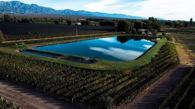 Amazing place. This lake reflects the sky in the morning. Shot from a drone with the Andes in the distance. Wonderful wines and an beautiful polo lodge #BVSBlue