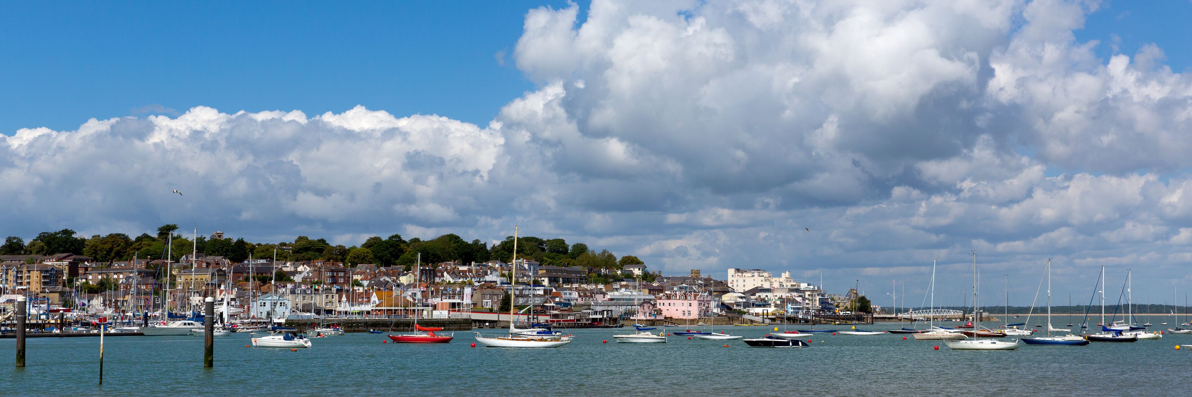 Cowes harbour Isle of Wight on a calm blue sky summer day