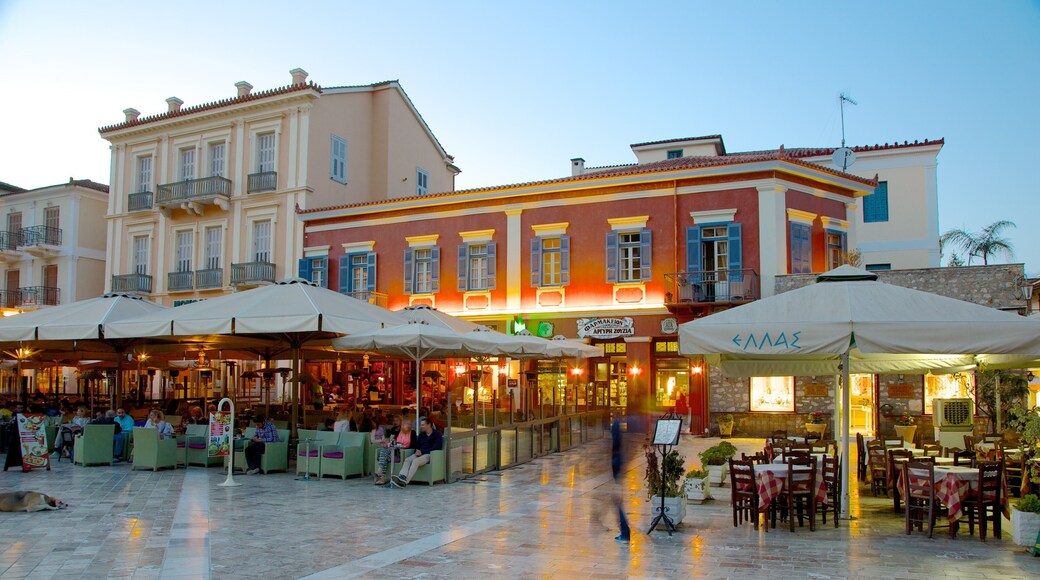 Place de la Constitution qui includes coucher de soleil