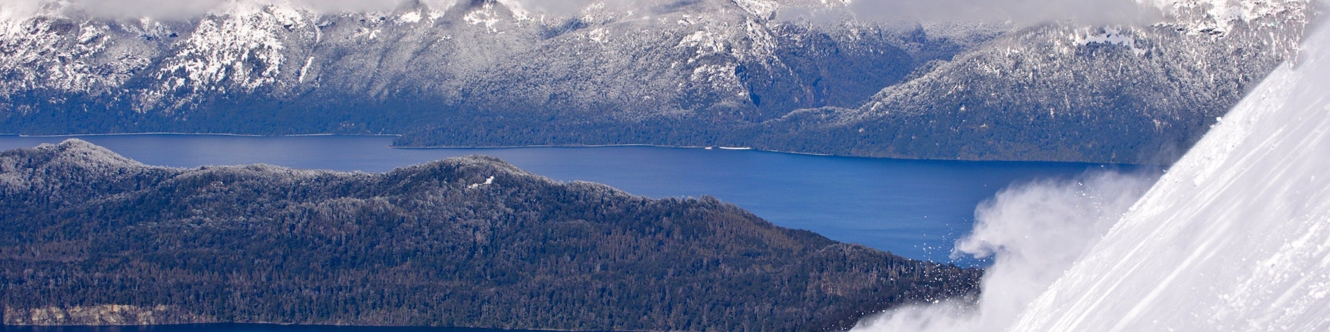 Cerro Bayo which includes a river or creek, mountains and snow boarding