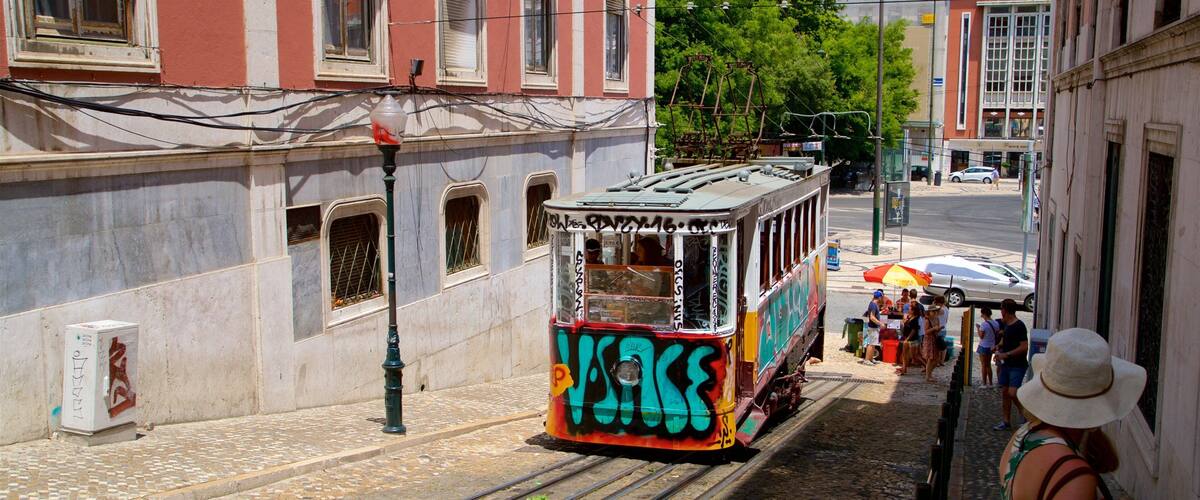 Ascensor da Gloria showing street scenes, outdoor art and railway items