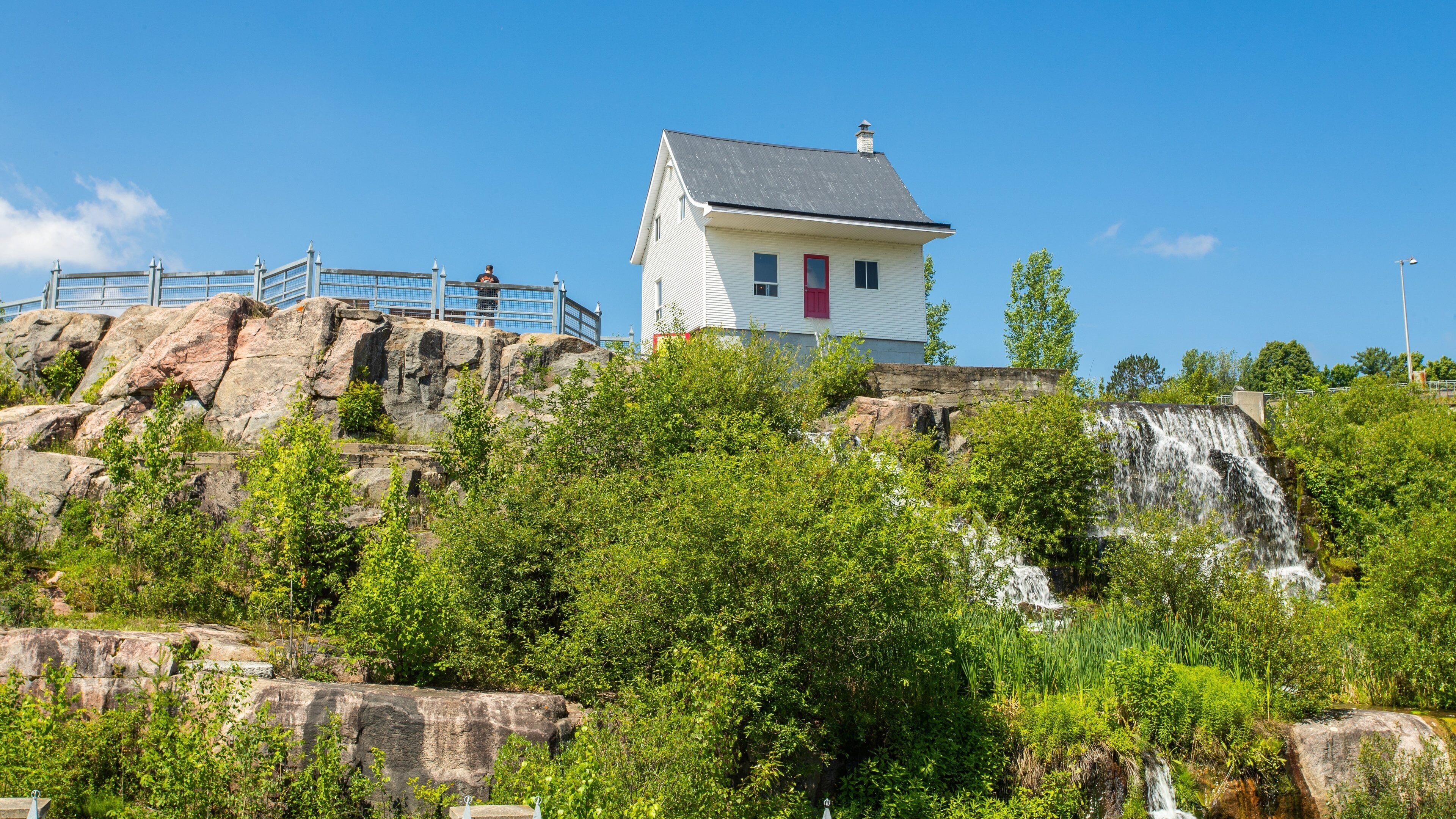 Petite Maison Blanche Museum featuring a cascade and views