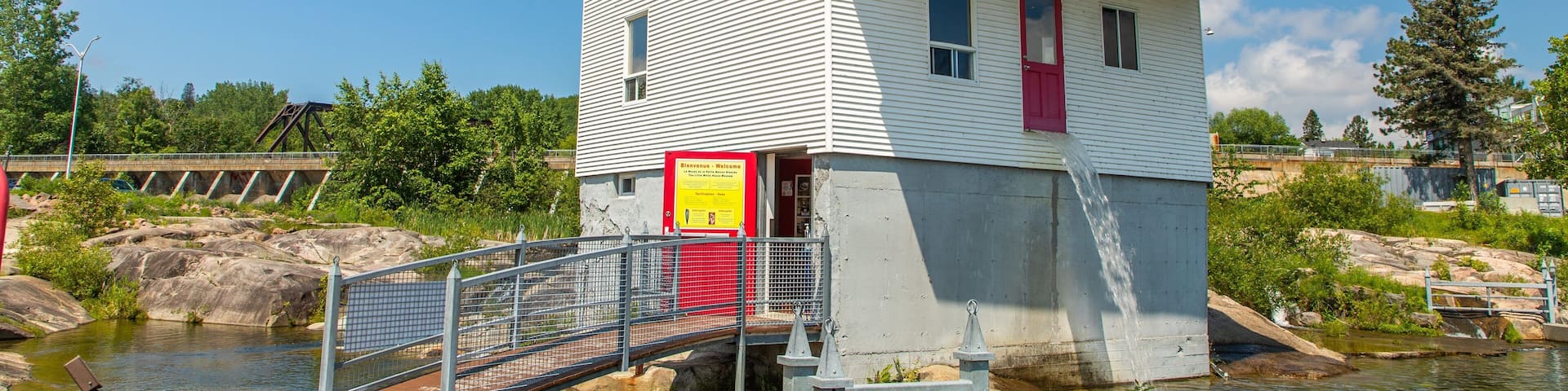 Petite Maison Blanche Museum showing a river or creek