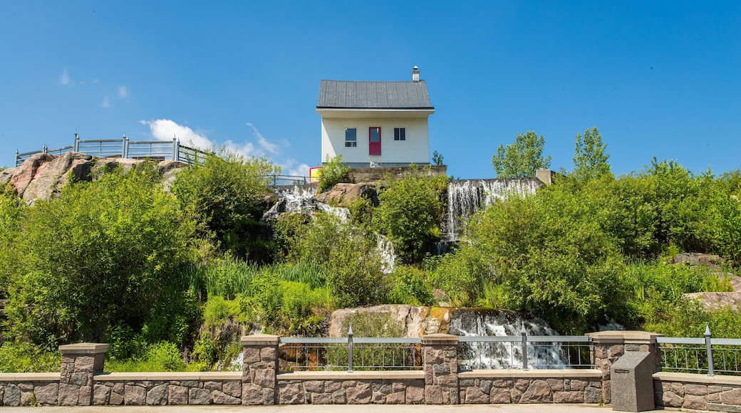 Petite Maison Blanche Museum which includes a waterfall