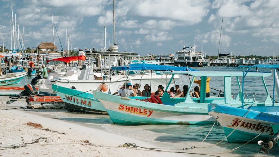 North Beach showing a beach and a bay or harbor as well as a small group of people