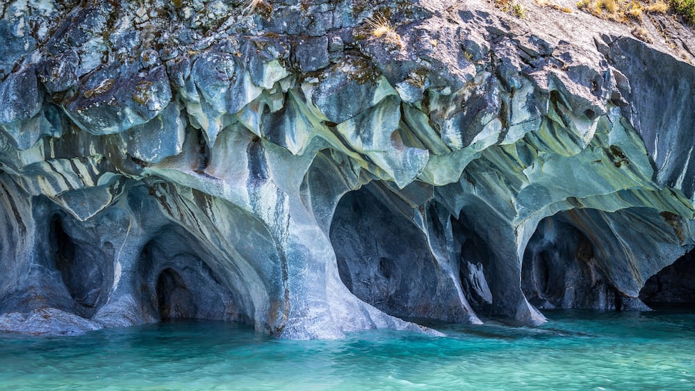 The Marble Caves (Spanish: Cuevas de Marmol ), a series of naturally sculpted caves in the General Carrera Lake in Chile, Patagonia, South America.