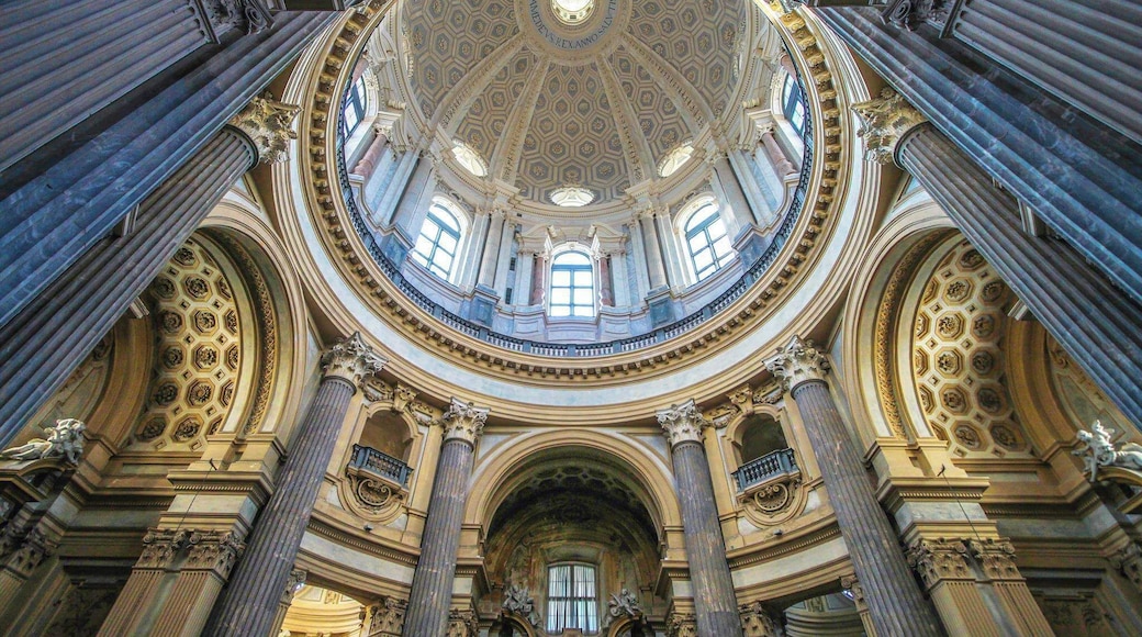 Built in the 1700's, Basilica di Superga has stunning Baroque-Classicism architecture with a dome that resembles some elements of Michelangelo's Dome at St. Peter's Basilica. It sits perched on top a mountain looking down on the city of Turin and is known for the Royal Crypt, which houses the Savoy family, Dukes and Kings. #blue
#turin #torino #italy #travelitaly #travel #italytourism #travelturin #turintourism #superga #basilicadisuperga #troveon #wanderlust #globetrotter #travelphotographer #architecture #landmark #symmetry