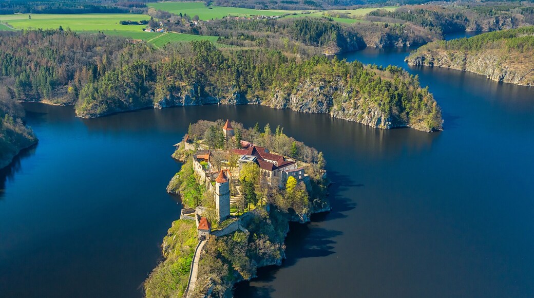 Originally a small complex, the castle was continuously extended until 1278. After the Přemyslid dynasty died out in 1306, Zvíkov became property of the Rožmberk family. After 1337 the settlement under the castle has been fortified, as a part of thorough repairs. Its fortifications were so strong that even the Hussites, during the Hussite Wars, besieged it for four months in 1429, but found it a tough nut to crack and failed to take it. To protect against heavy artillery its walls were further strengthened