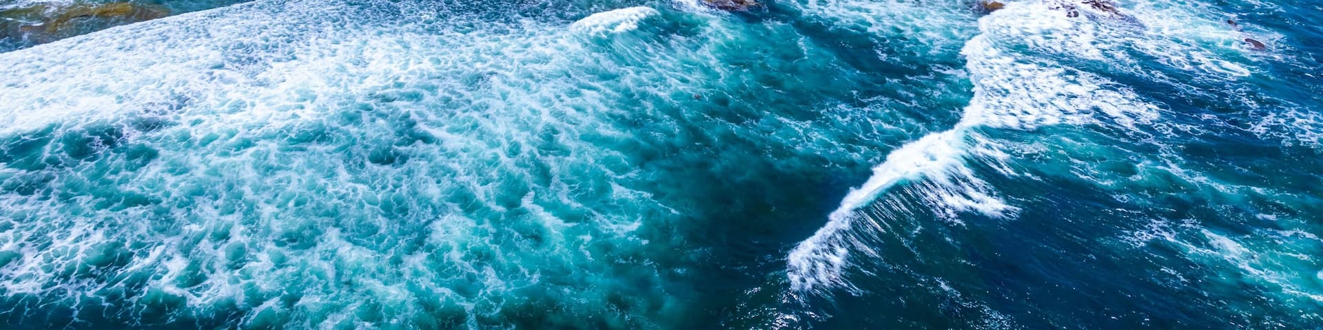 Drone shot over Sunset Cliffs in San Diego on a sunny day
