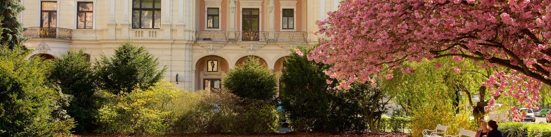 Karlovy Vary Municiple Theater featuring a garden and heritage elements