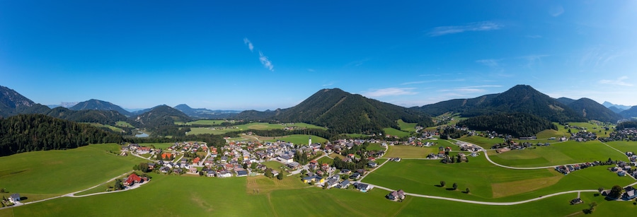 Austria, Salzburger Land, Faistenau, Drone panorama of idyllic village in Salzkammergut