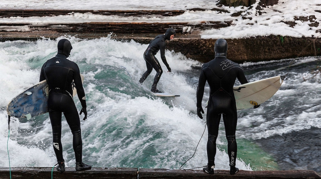 Eisbach Surfing which includes surfing and surf as well as a small group of people