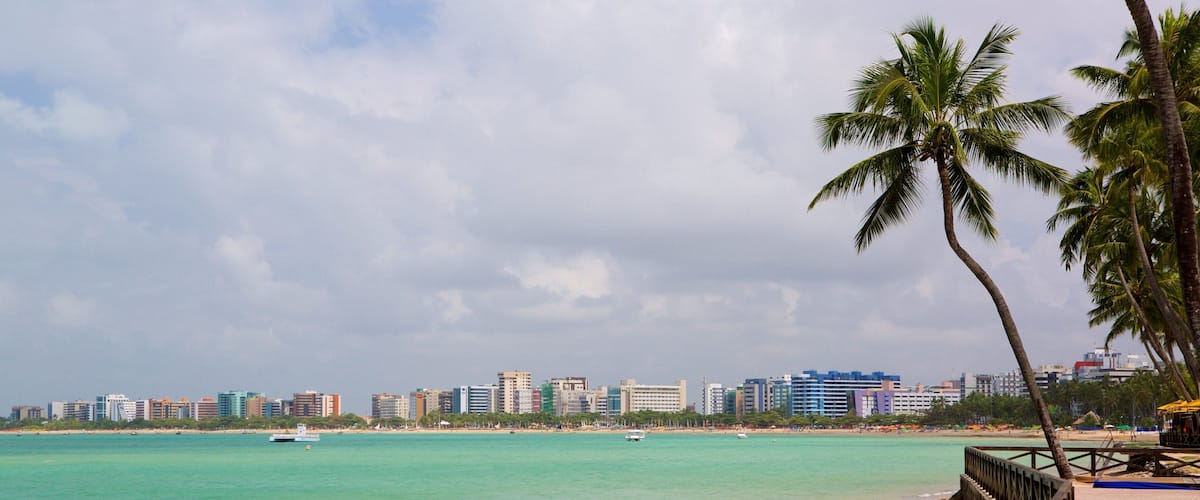 Ponta Verde Beach featuring a beach, a coastal town and general coastal views