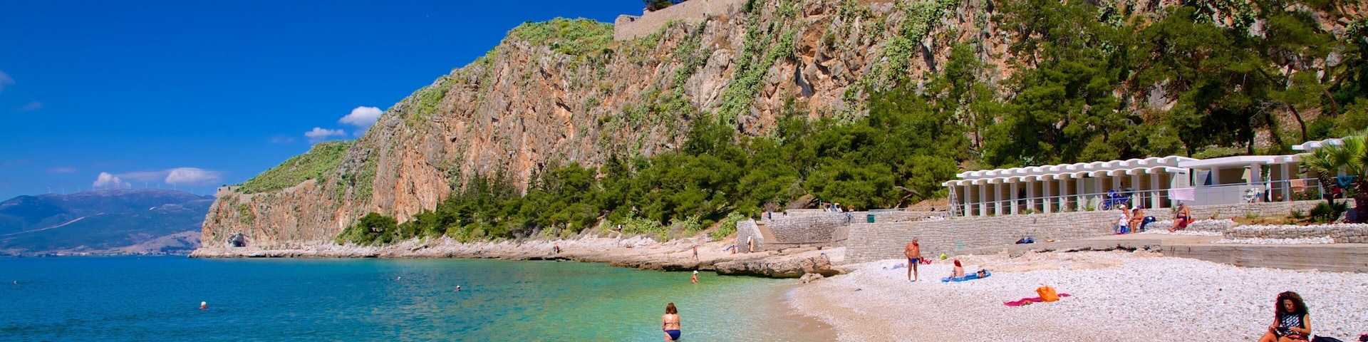 Arvanitia Beach featuring a pebble beach