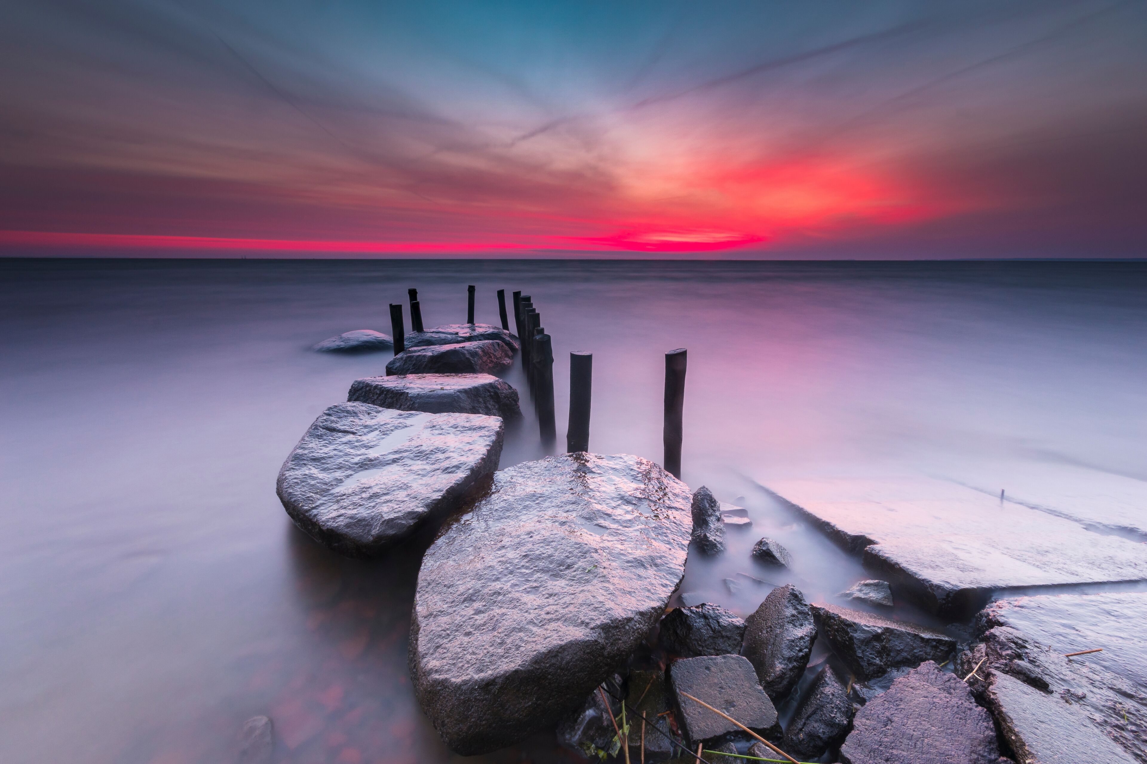 sunrise over the sea, stone harbor, long exposure
