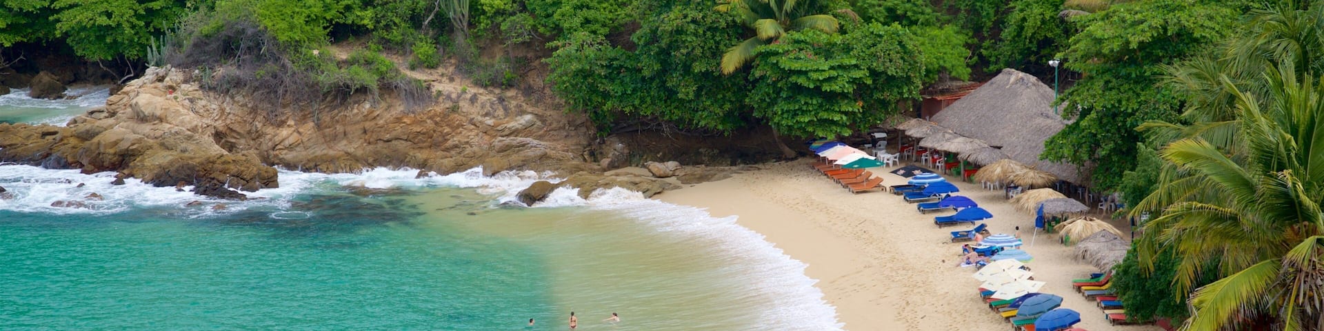 Carrizalillo Beach showing a beach, rugged coastline and general coastal views