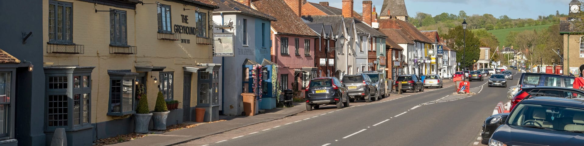 Stockbridge, Hampshire, England, UK. 2021. Stockbridge main street with colourful buildings where drovers drove their sheep and cattle. One of the smallest towns in United Kingdom