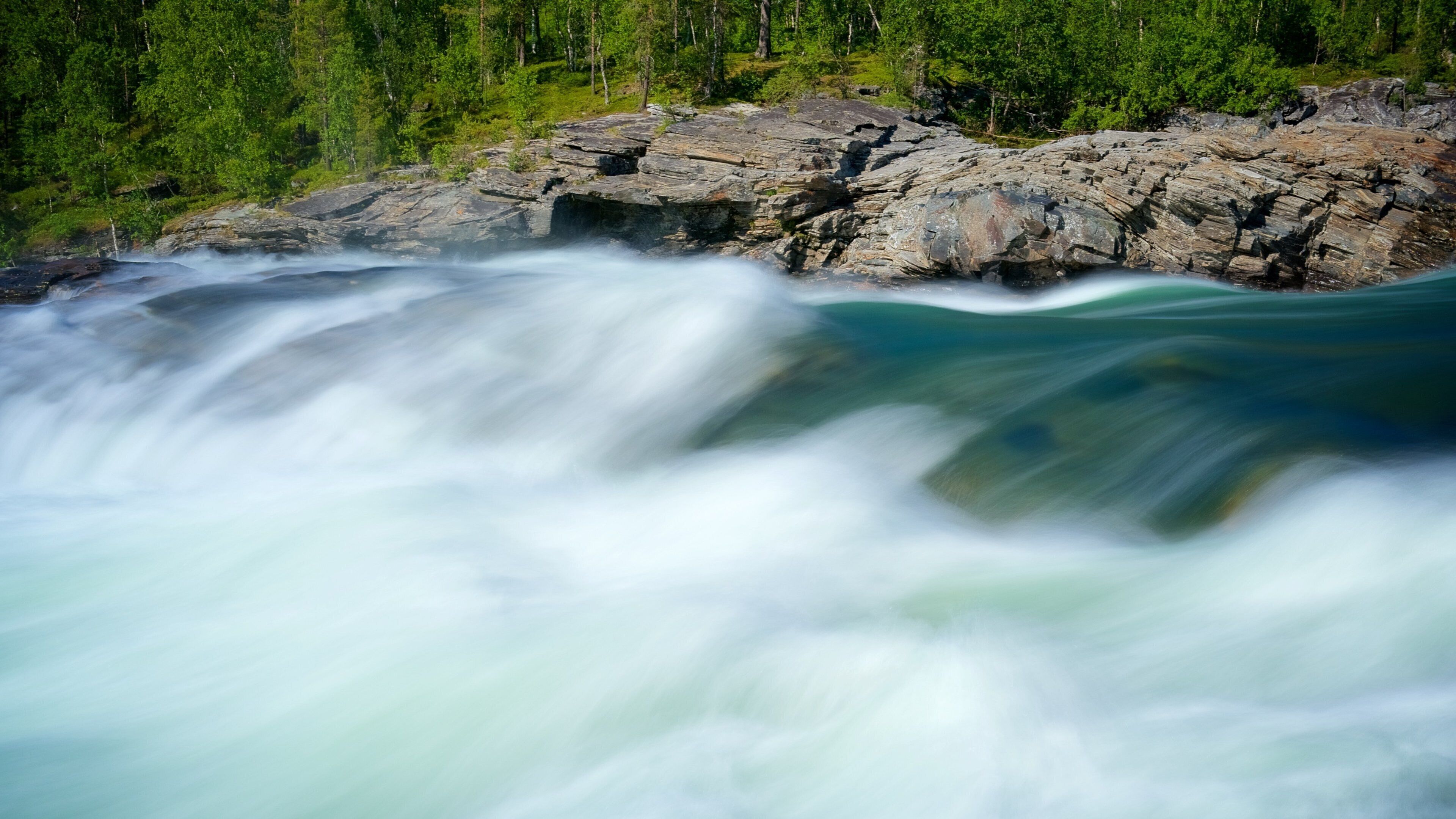 Maalselvfossen showing a river or creek and rapids