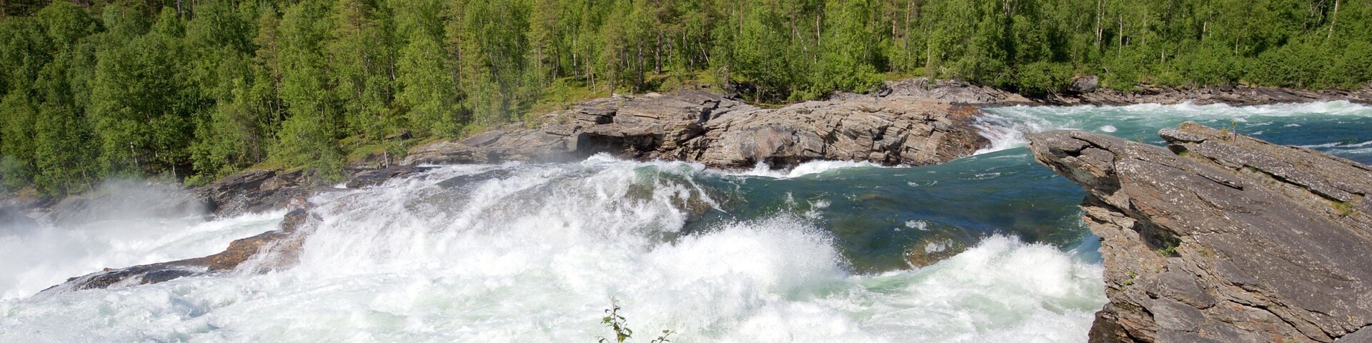 Maalselvfossen Waterfall which includes rapids