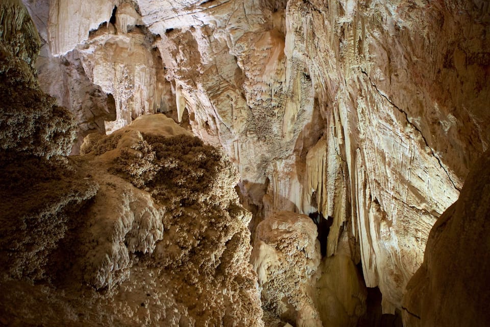 A cave with stalactites and stalagmites.