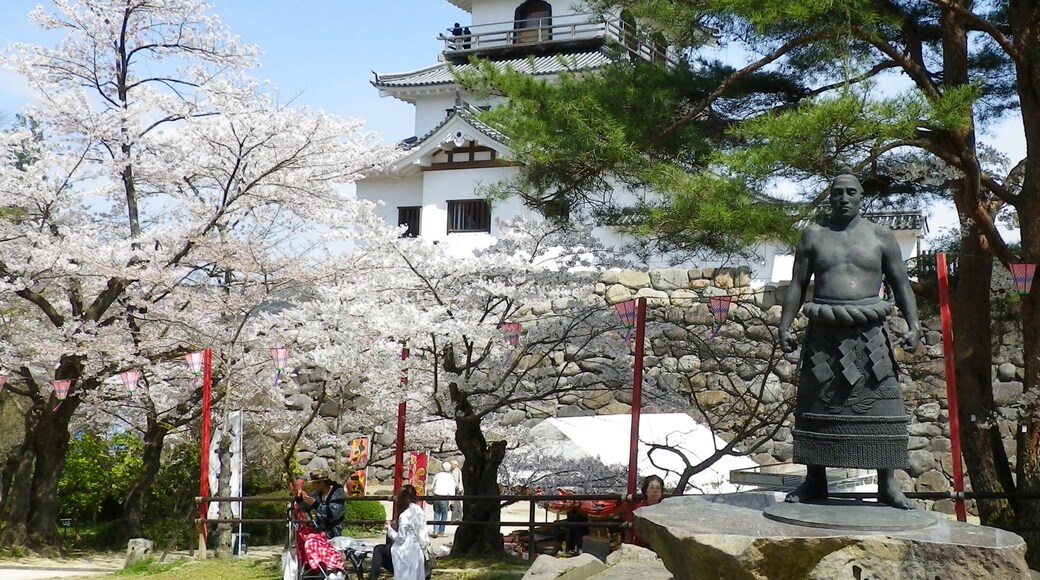 Shiroishijo Castle and a statue of Ōzutsu Man'emon in Shiroishi city, Miyagi prefecture