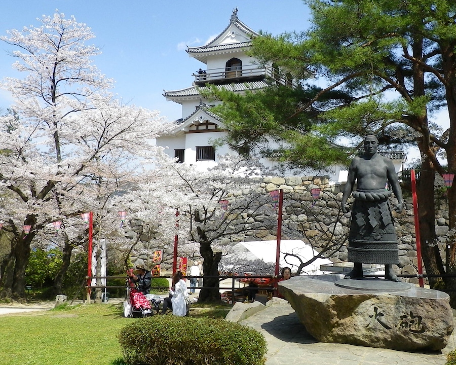 Shiroishijo Castle and a statue of Ōzutsu Man'emon in Shiroishi city, Miyagi prefecture