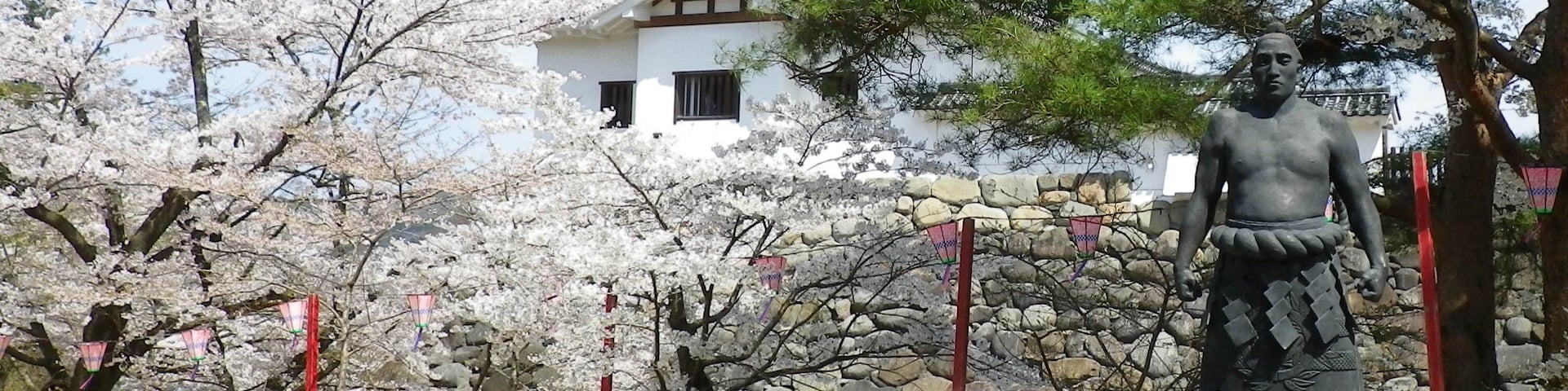 Shiroishijo Castle and a statue of Ōzutsu Man'emon in Shiroishi city, Miyagi prefecture