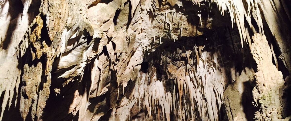 A cave with stalactites and stalagmites.