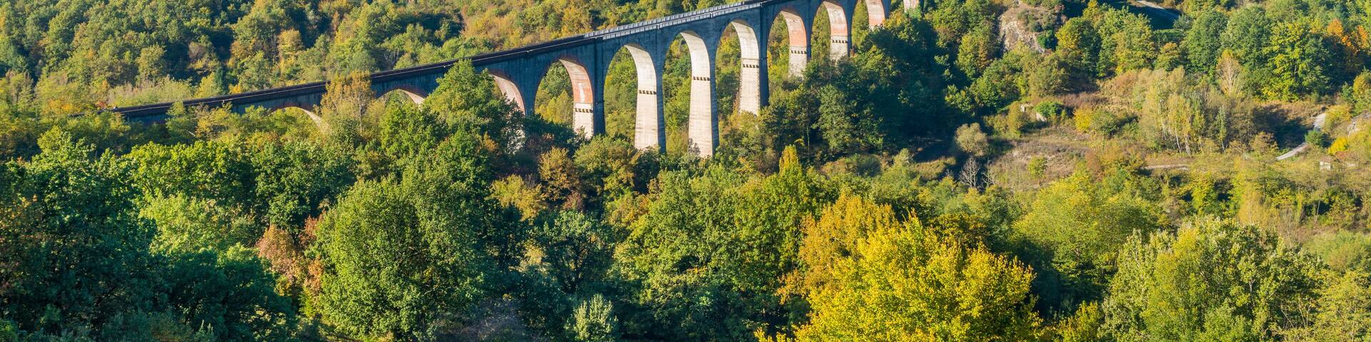 Idyllic landscape with the village of Poggio and the Apuan Alps in the background. Province of Lucca, Tuscany, central Italy.