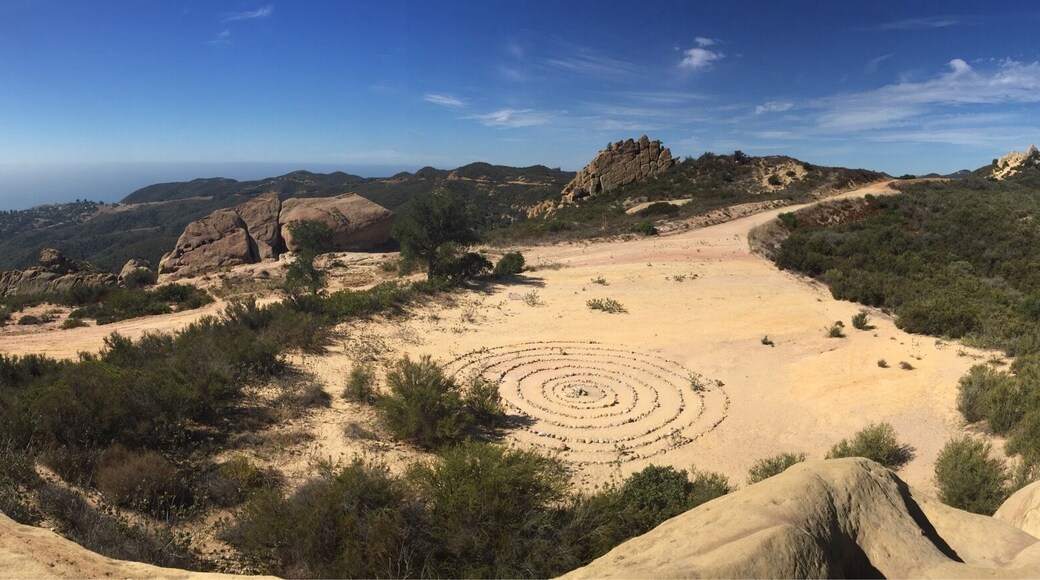Great place for a short hike to the medicine wheel which is fun to see. Much cooler are all the rock formations that Are amazing to see. Best to go during the week as it is not so busy but if weekend is the only time then go early or late. Very busy :-)