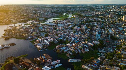 Manaus cityscape river amazon rainforest drone aerial sunset Brazil