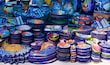 Traditional Mexican Pottery painted with beautiful colors, as sold in a street market