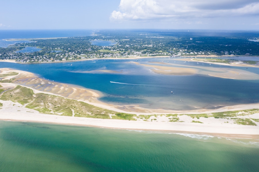 The nutrient-rich waters of the Atlantic Ocean bathe a scenic beach on Cape Cod, Massachusetts. This beautiful area of New England, not too far from Boston, is a popular summer vacation destination.