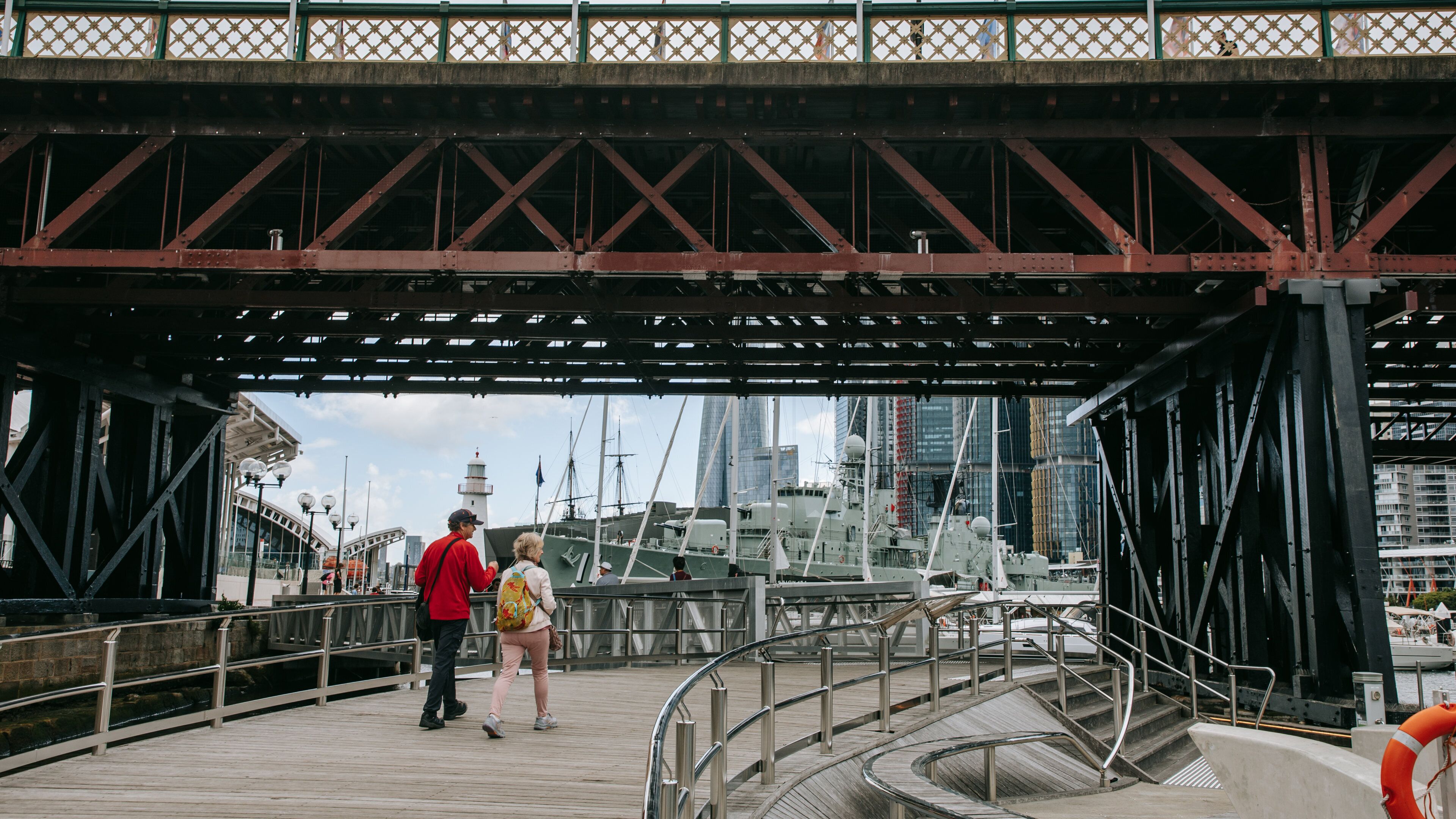 Pyrmont Bridge which includes a bay or harbor as well as a couple