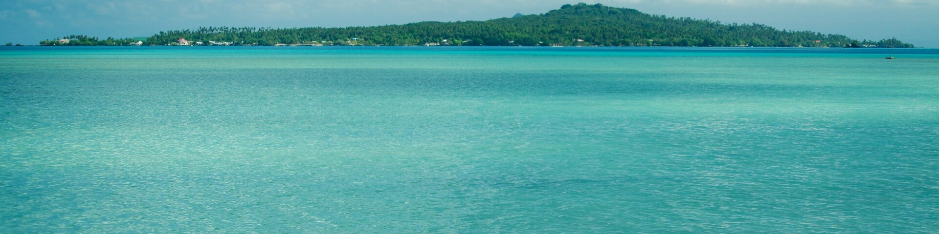 Manono mostrando imágenes de una isla, vista general a la costa y escenas tropicales